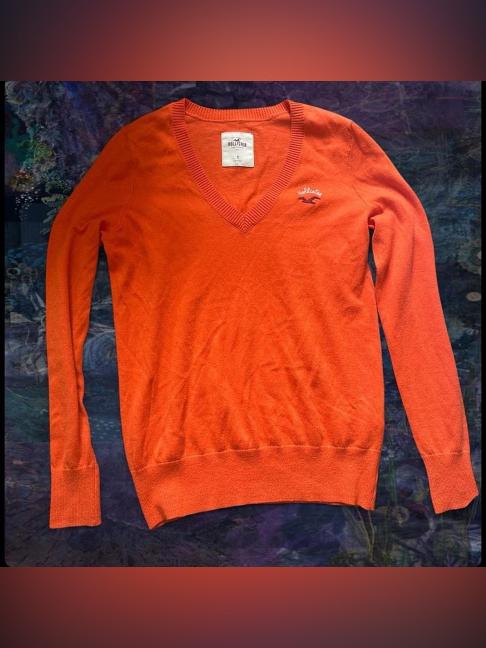 orange hollister embroidered long sleeve sweater